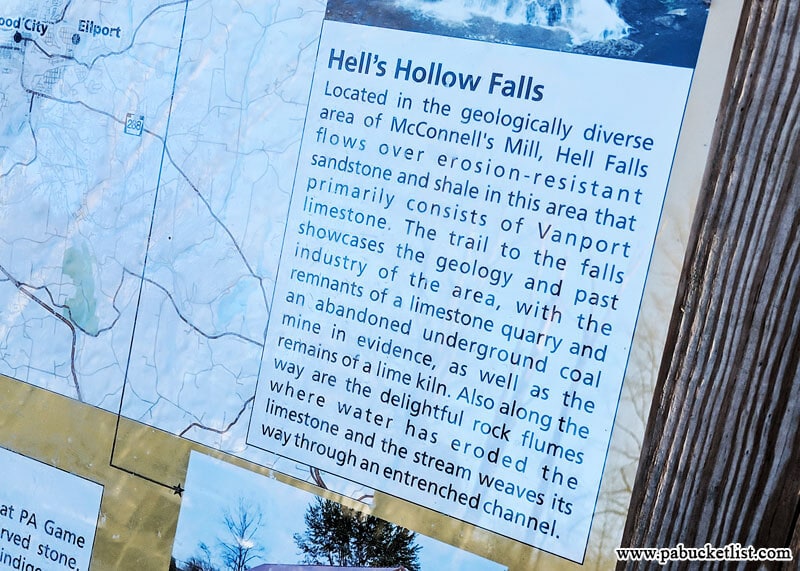 Sign at trail head with history of Hell's Hollow Falls.