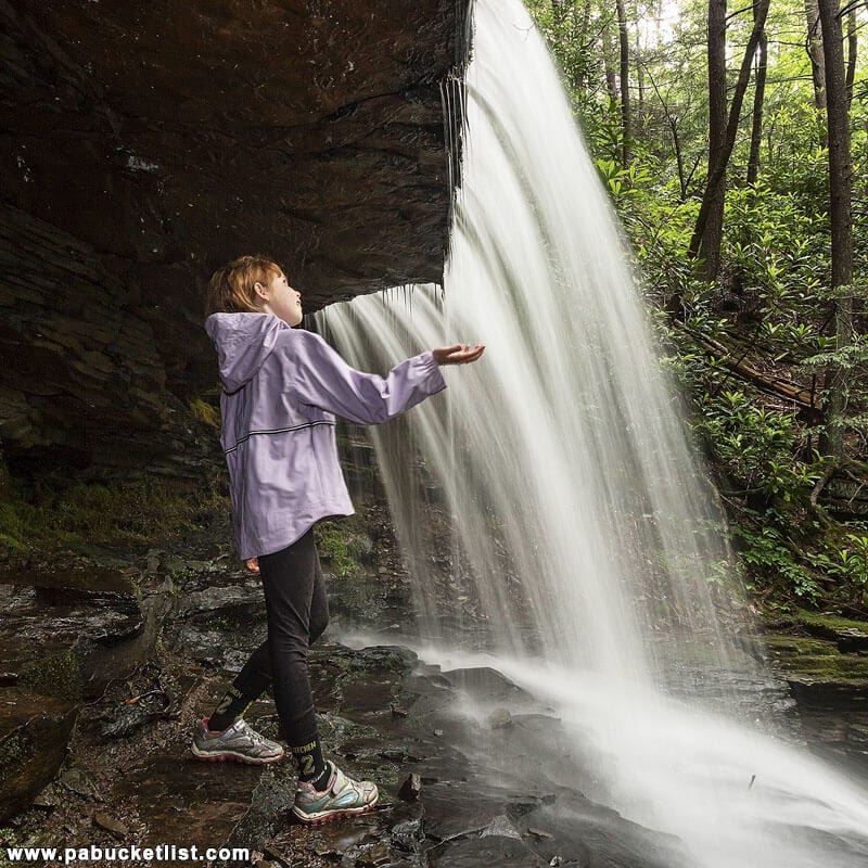 My daughter behind the upper tier of Round Island Run Falls.