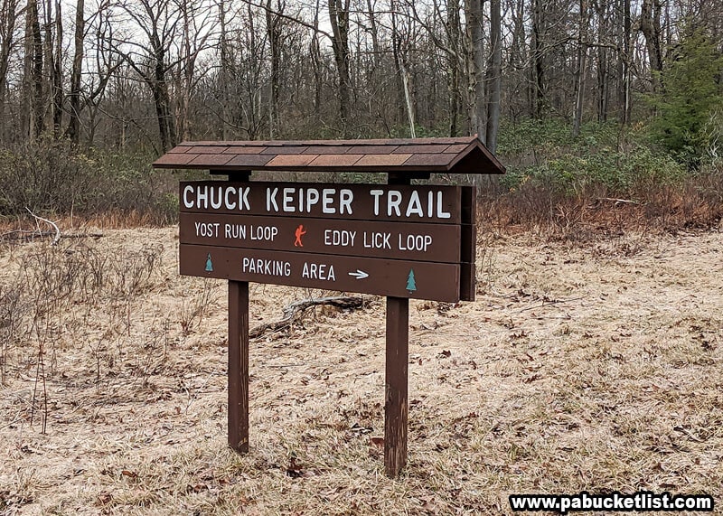 Chuck Keiper Trail sign along Route 144, opposite the parking area.