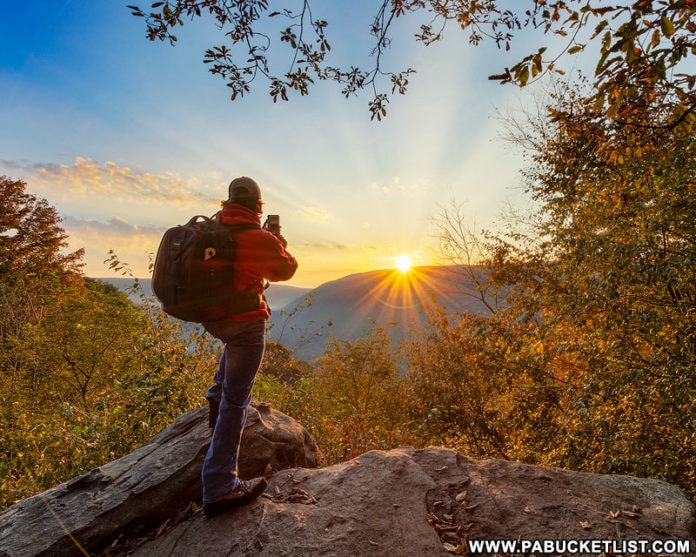 The author photographing an autumn sunrise at Baughman Rock Overlook.