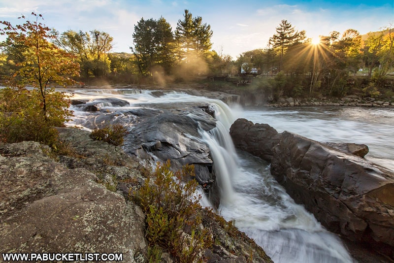 A magnificent autumn sunrise over Ohiopyle Falls.