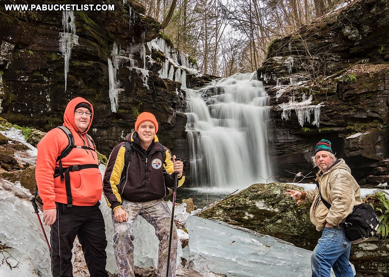 A group of adventurous hikers gathered at the base of Big Falls on State Game Lands 13 in Sullivan County, PA