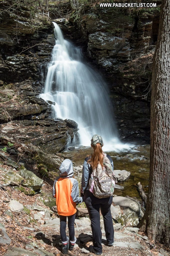 Hikers at Ozone Falls at Ricketts Glen State park.