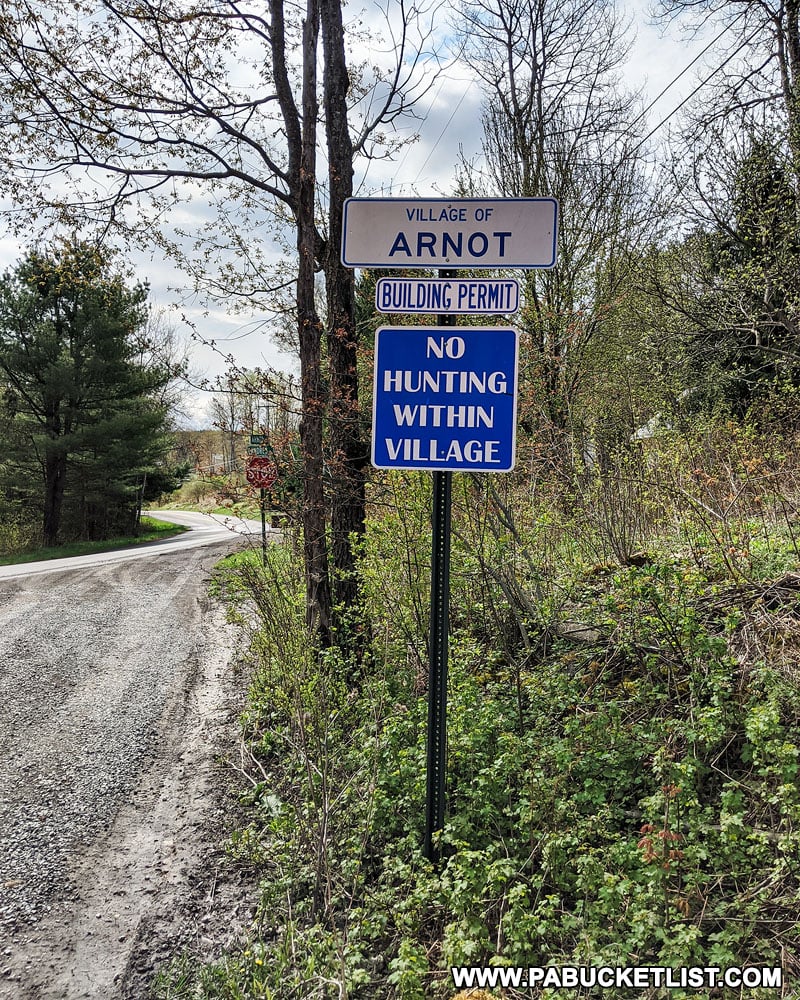Village of Arnot road sign in Tioga County PA
