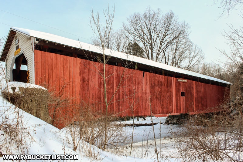 A side view of McGees Mills Covered Bridge in Pennsylvania
