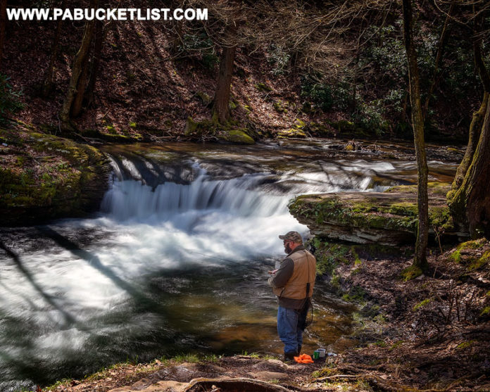 A fisherman at Wykoff Run Falls in Cameron County