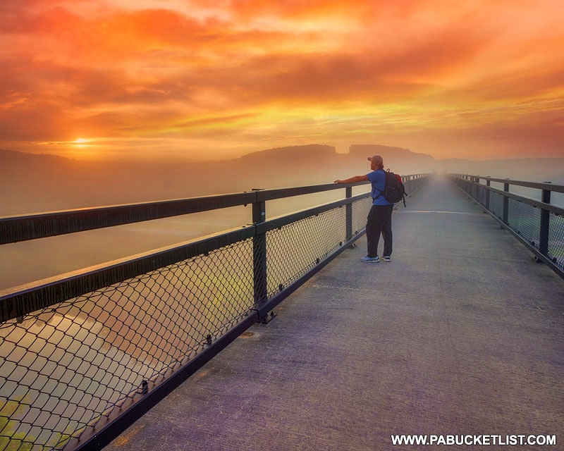 Rusty Glessner taking in the sunrise over the Salisbury Viaduct.