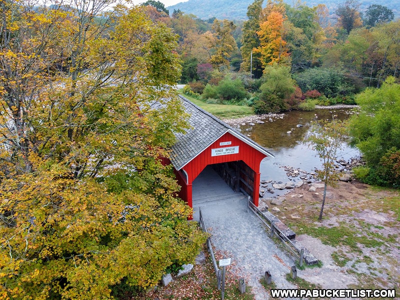 Fall foliage around Kings Covered Bridge in Somerset County PA.