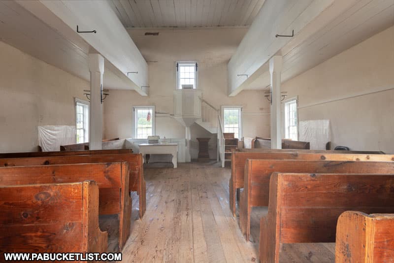 The pews inside the 1806 Old Log Church along the Lincoln Highway in Bedford County PA