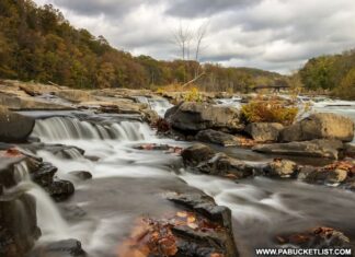 An autumn view of Youghioghney River from the Ferncliff Trail at Ohiopyle State Park.
