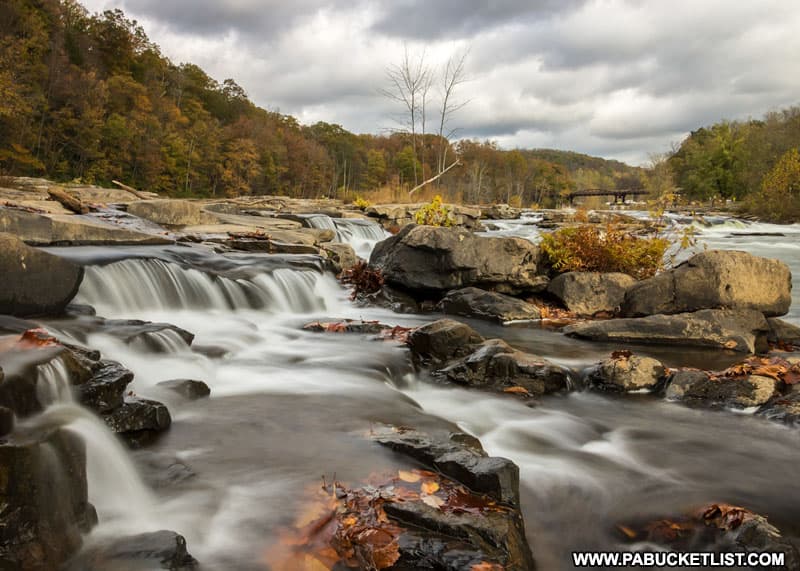 An autumn view of Youghioghney River from the Ferncliff Trail at Ohiopyle State Park.
