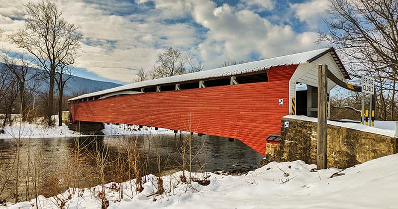 The Millmont Covered Bridge is also known as the Millmont Red Bridge.