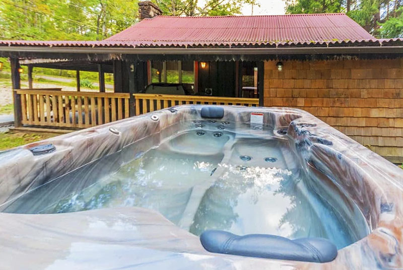 Hot tub at a Laurel Highlands rental cabin.