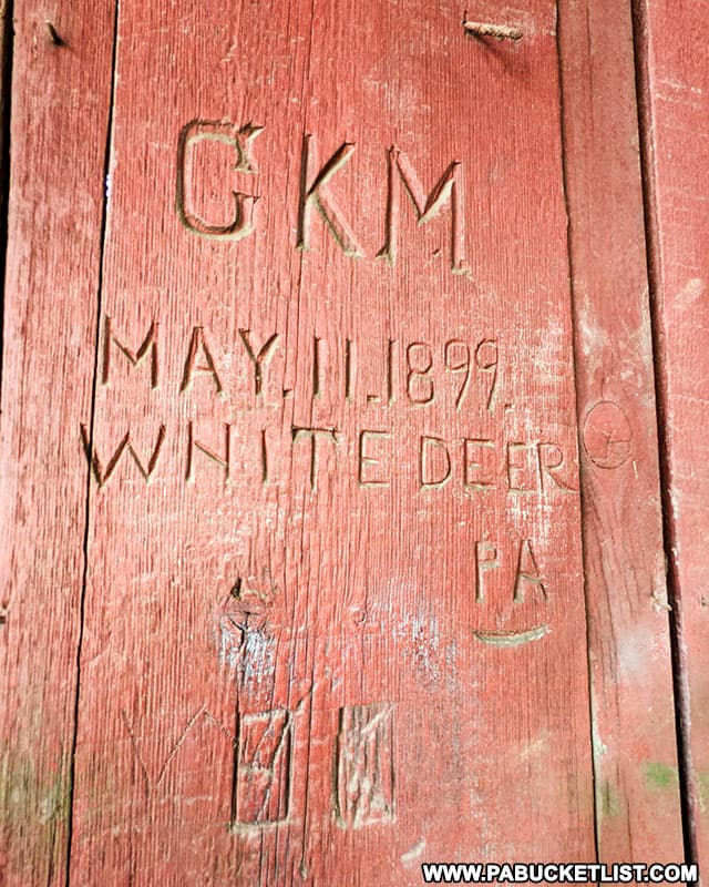 Carving from 1899 inside Factory Covered Bridge in Union County PA