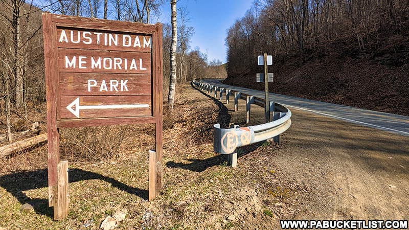 Austin Dam Memorial Park sign along Route 872 in Potter County PA.