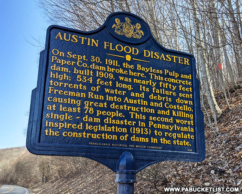 Roadside historical marker about the Austin Dam Flood.