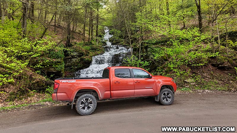 Toyota Tacoma parked in front of Holcomb Falls along Leroy Mountain Road in Bradford County PA