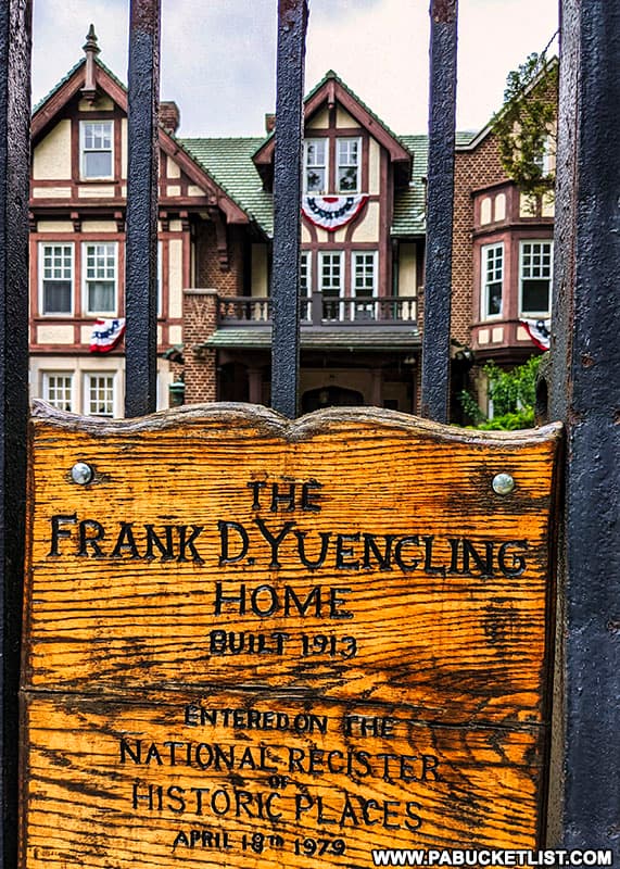 National Register of Historic Places sign on the gates of the Frenk Yuengling mansion in Pottsville.