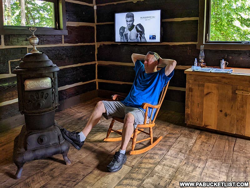 Relaxing inside Muhammad Ali's cabin at Fighter's Heaven in Deer Lake, Pennsylvania.