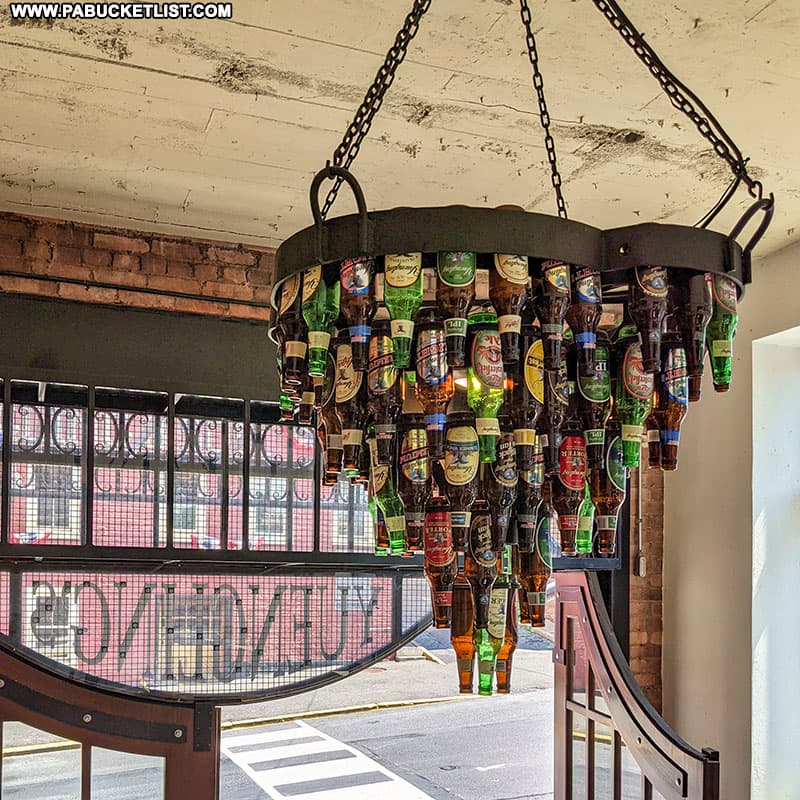 A chandelier made of Yuengling bottles hanging in the lobby of the Yuengling museum and gift shop in Pottsville.