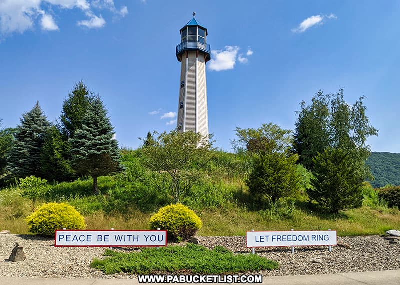 Signs along the walkway at Peace Park on Lighthouse Island in Tionesta PA.