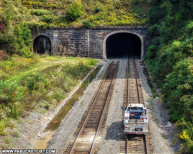 An eastbound maintenance truck heads into the Allegheny Tunnel in Gallitzin.