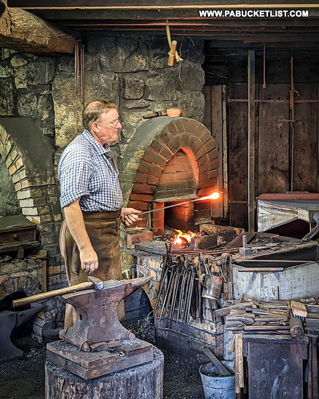 Blacksmithing demonstration at Old Bedford Village.