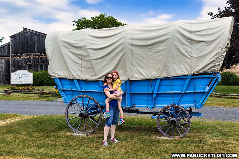 Covered wagon outside the Old Bedford Village Welcome Center.