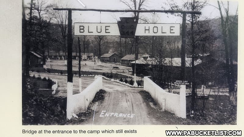 Historical photo of the Blue Hole CCC camp, part of a display at the current picnic area where the CCC camp once stood.