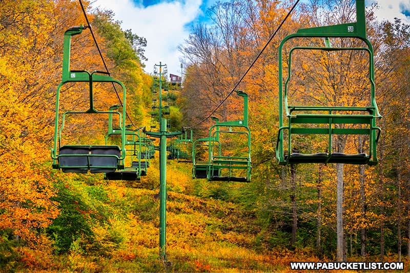 Beautiful fall foliage surrounding the abandoned ski lifts at Denton Hill State Park.