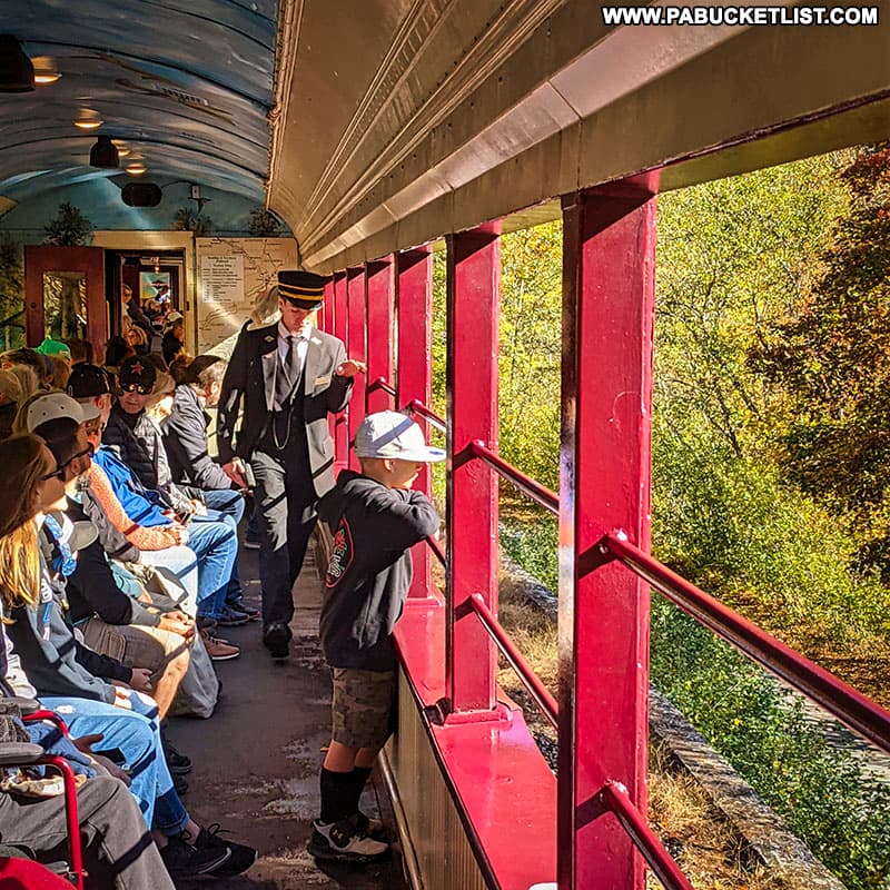 Inside one of the open air cars on the Lehigh Gorge Scenic Railway fall foliage excursion.