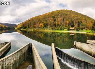 A panoramic view of Lyman Run lake and dam at Lyman Run State Park in Potter County, Pennsylvania.
