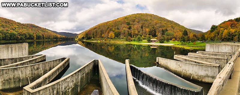 A panoramic view of Lyman Run lake and dam at Lyman Run State Park in Potter County, Pennsylvania.