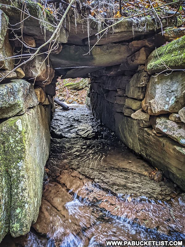 Inside the stone aqueduct immediately downstream from Fish Run Falls in Westmoreland County.