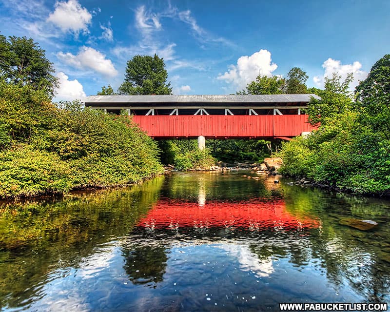 Side view of the Glessner Covered Bridge in Somerset County on a summer afternoon.