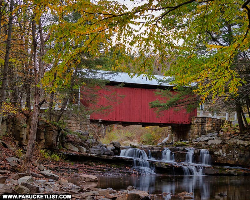 Fall foliage around the Pack Saddle Covered Bridge in October, 2021.