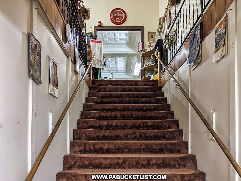 Stairway leading to the second floor of the old theatre which now houses the Plaza Centre antique gallery in downtown Bellefonte.