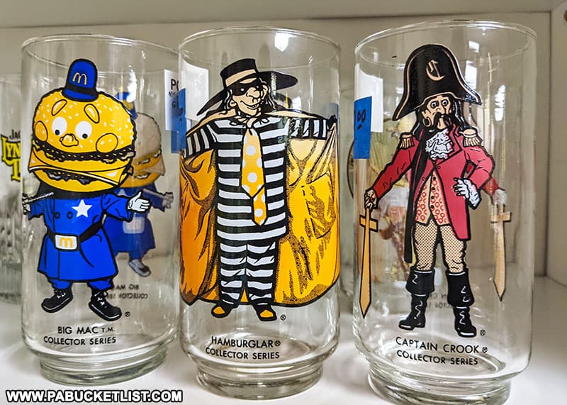 Vintage McDonalds glasses for sale at the Plaza Centre antique gallery and flea market in Bellefonte, PA.