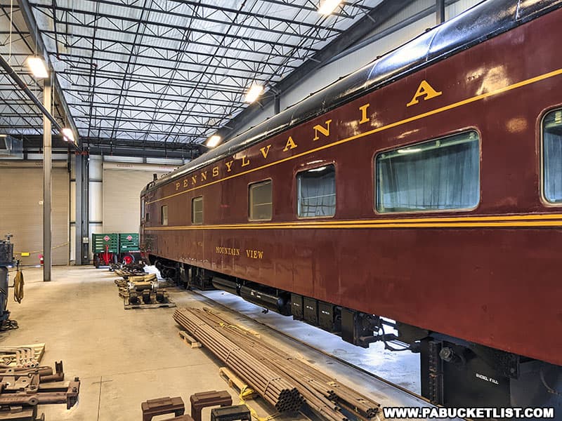 Pennsylvania Railroad car undergoing restoration inside the roundhouse at the Altoona Railroaders Memorial Museum.
