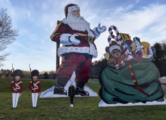 12 year old standing in front of the tallest Santa in PA for a sense of scale.