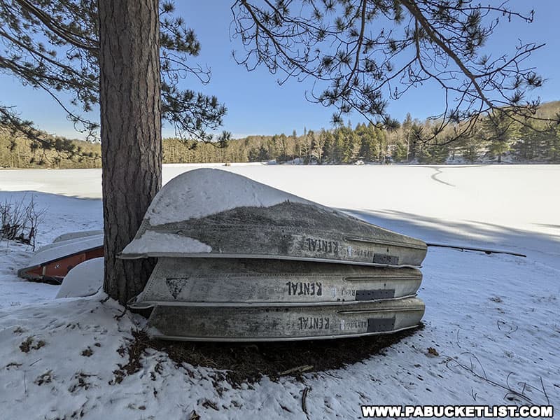 Snow-covered rental boats at Parker Dam State Park.