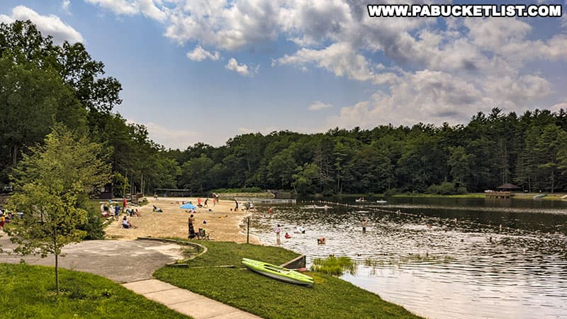 The beach area at Whipple Dam State Park on a summer afternoon.