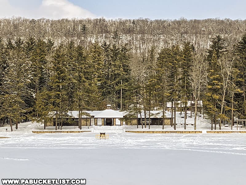 Looking across Halfway Lake towards the snow-covered beach at RB Winter State Park in Union County Pennsylvania.