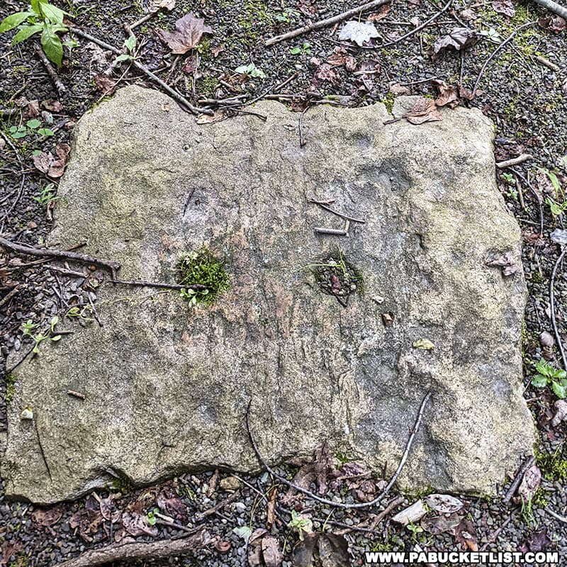 A stone sleeper that rails on the Allegheny Portage Railroad would have been attached to.