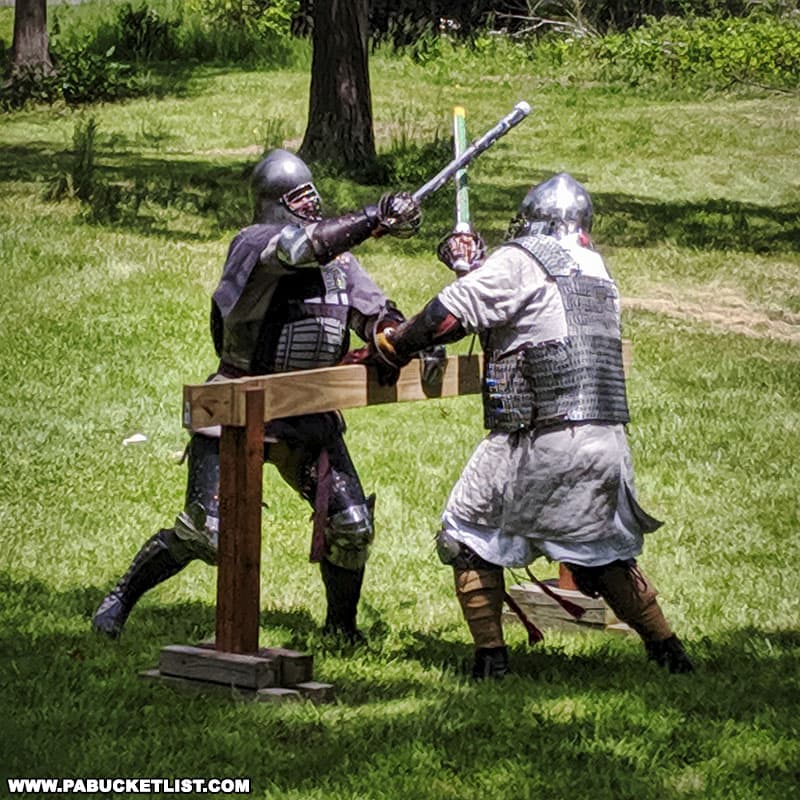 Medieval reenactors doing battle n the grounds of the Boal Mansion on Memorial Day weekend.