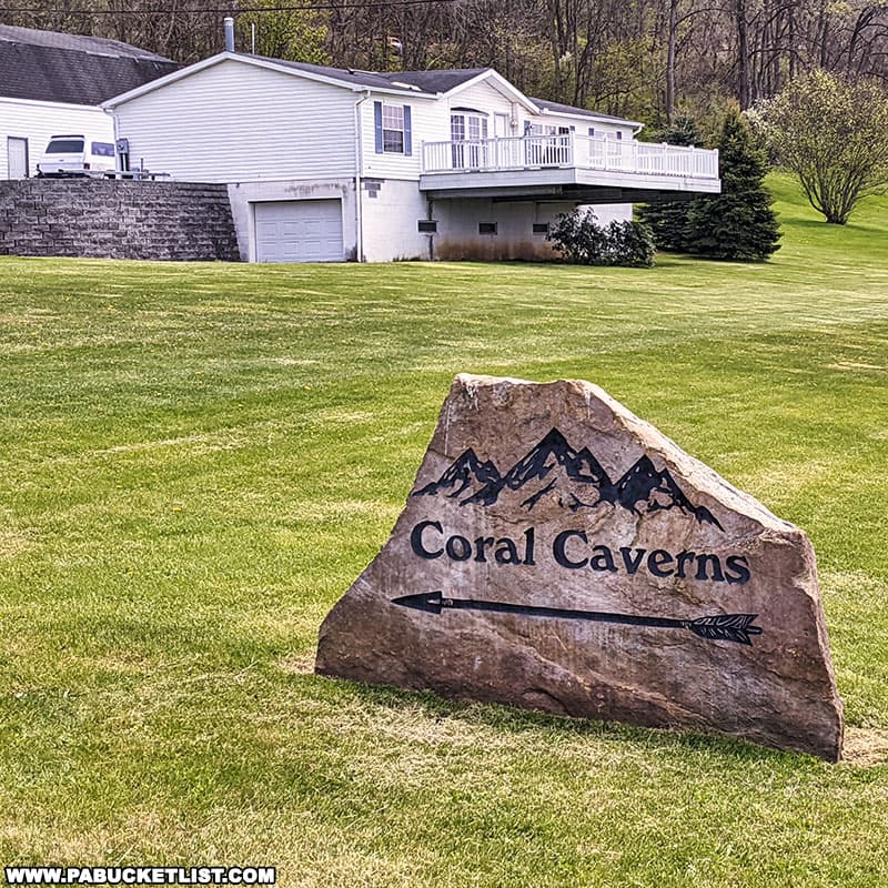Directional sign to Coral Caverns in Manns Choice, Bedford County Pennsylvania.