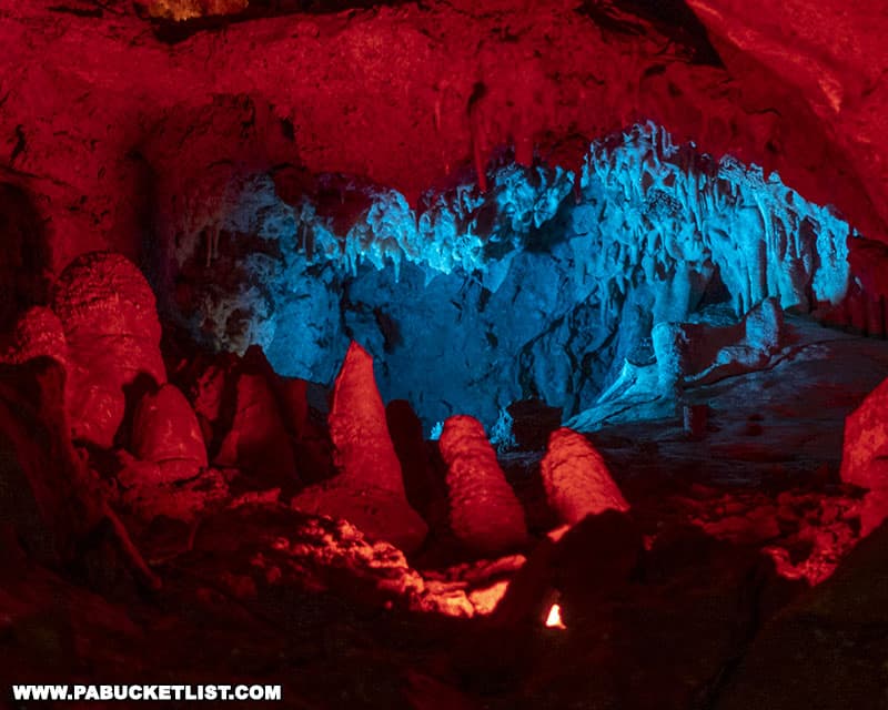 Red and blue lights illuminating some of the speleothems inside Coral Caverns in Bedford County Pennsylvania.