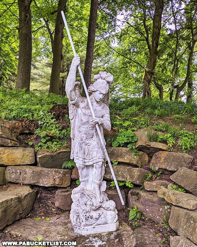 Saint Michael the Archangel statue in the Rock Garden behind the Sunken Gardens at Mount Assisi.