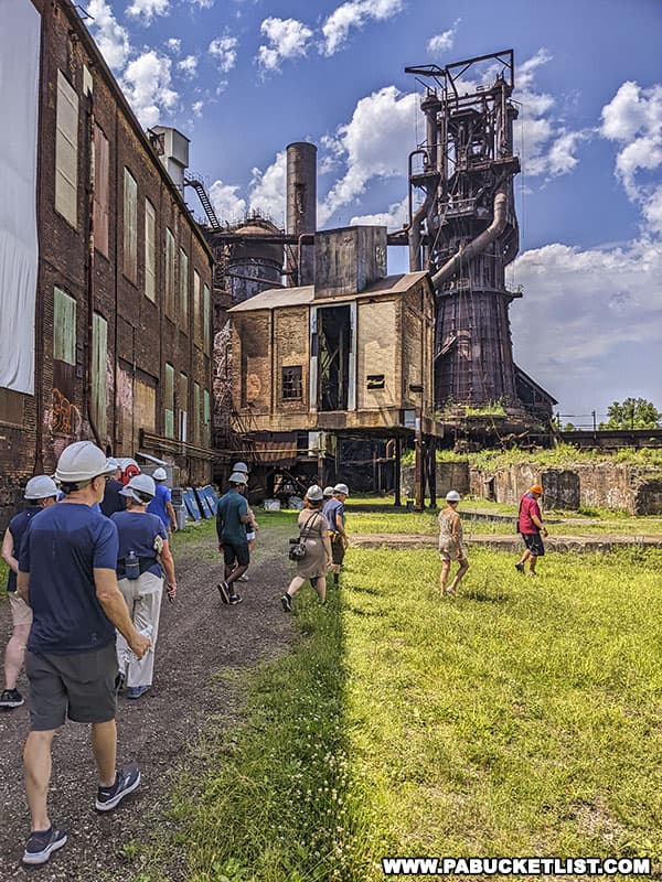 Walking the grounds of the Carrie Blast Furnaces with a tour guide from the Rivers of Steel heritage preservation group.