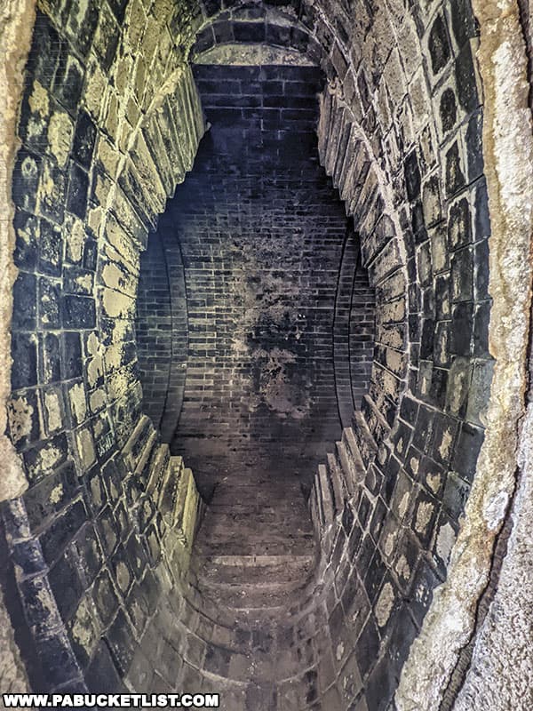 The brick-lined interior of one of the "torpedocars" used to transport molten iron across the river to the steel mills in Homestead.
